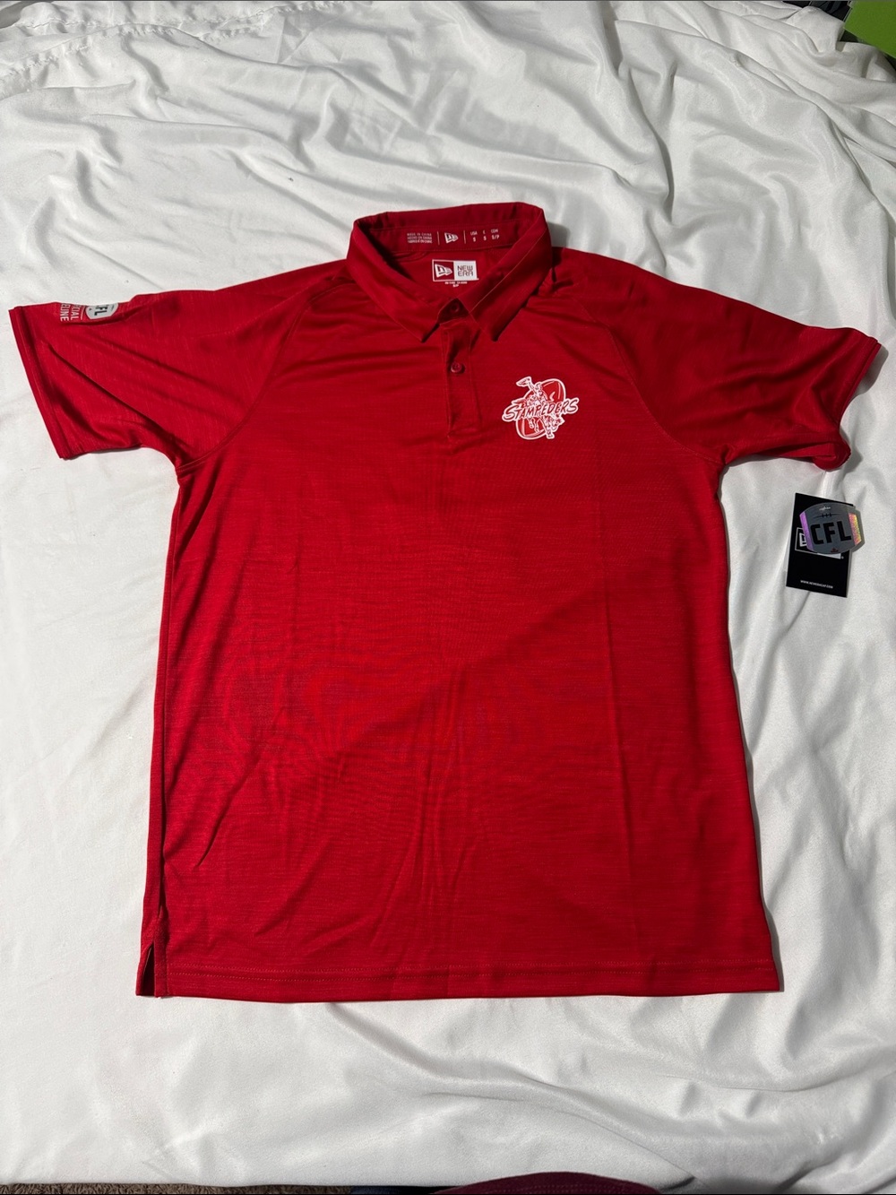 New Era Calgary Stampeders CFL Official Sideline Polo Red Size S NWT Performance